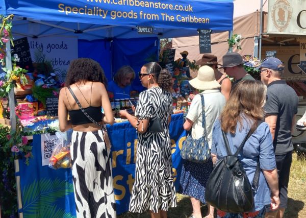 People at the Caribbean Store Booth At Reading Food Festival